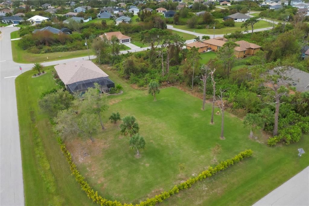 The lots directly behind the home and the adjacent lot to the West are included with the sale of the home, allowing for privacy or future expansion.