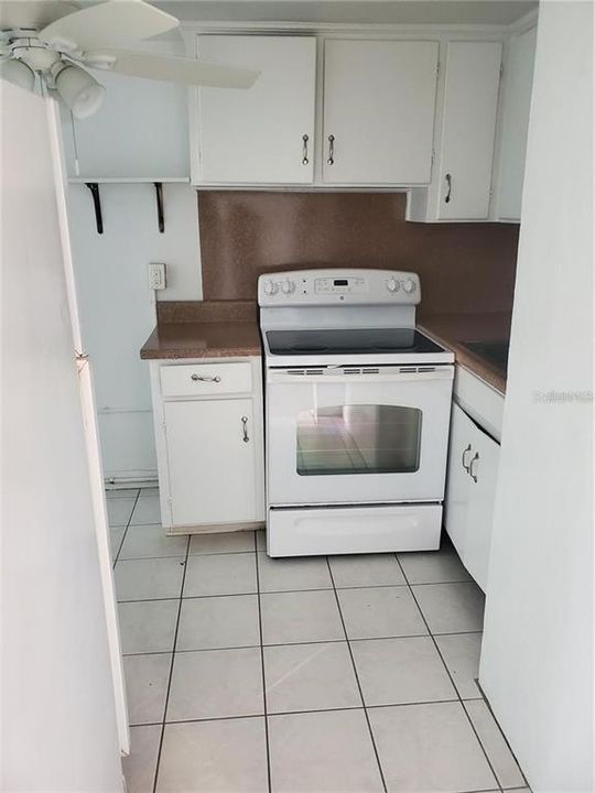 Kitchen with eat-in area (current floor being replaced)