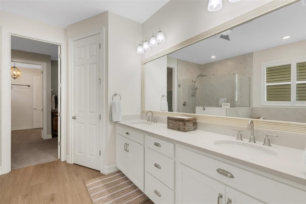 Primary bathroom with double sinks and water closet