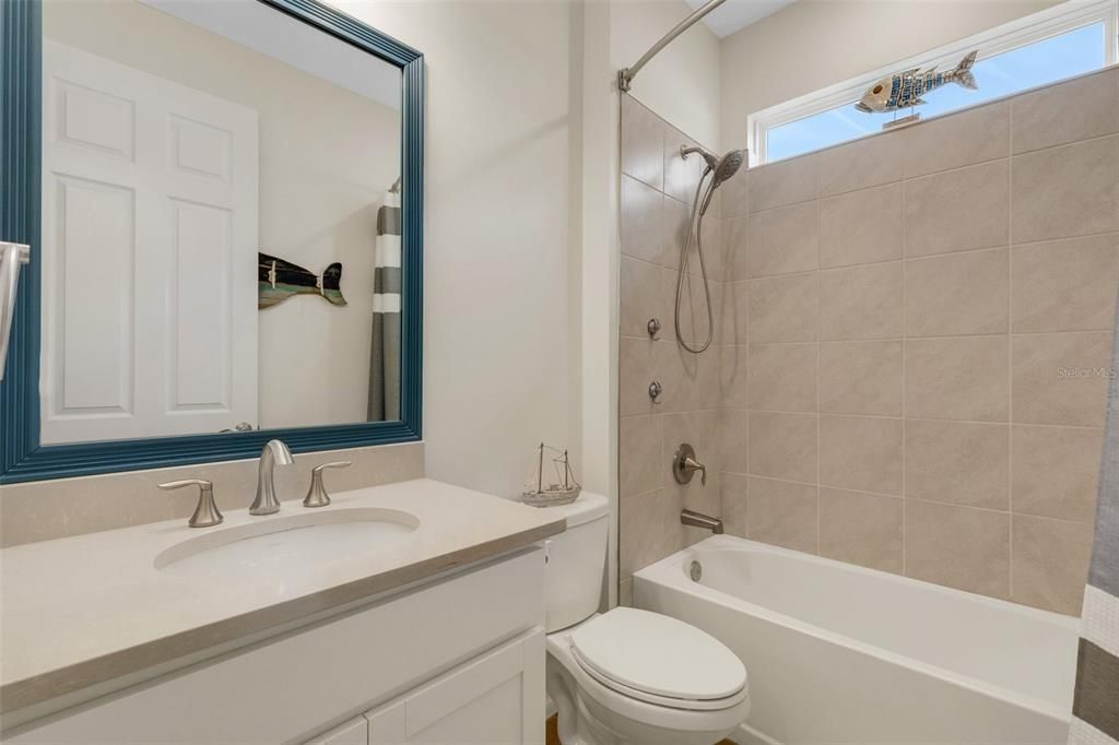 Guest bathroom with tub/shower combination