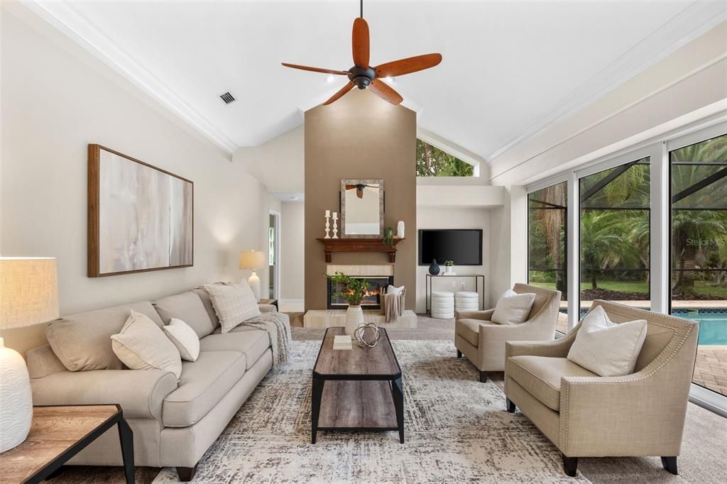 Large family room overlooking the pool area