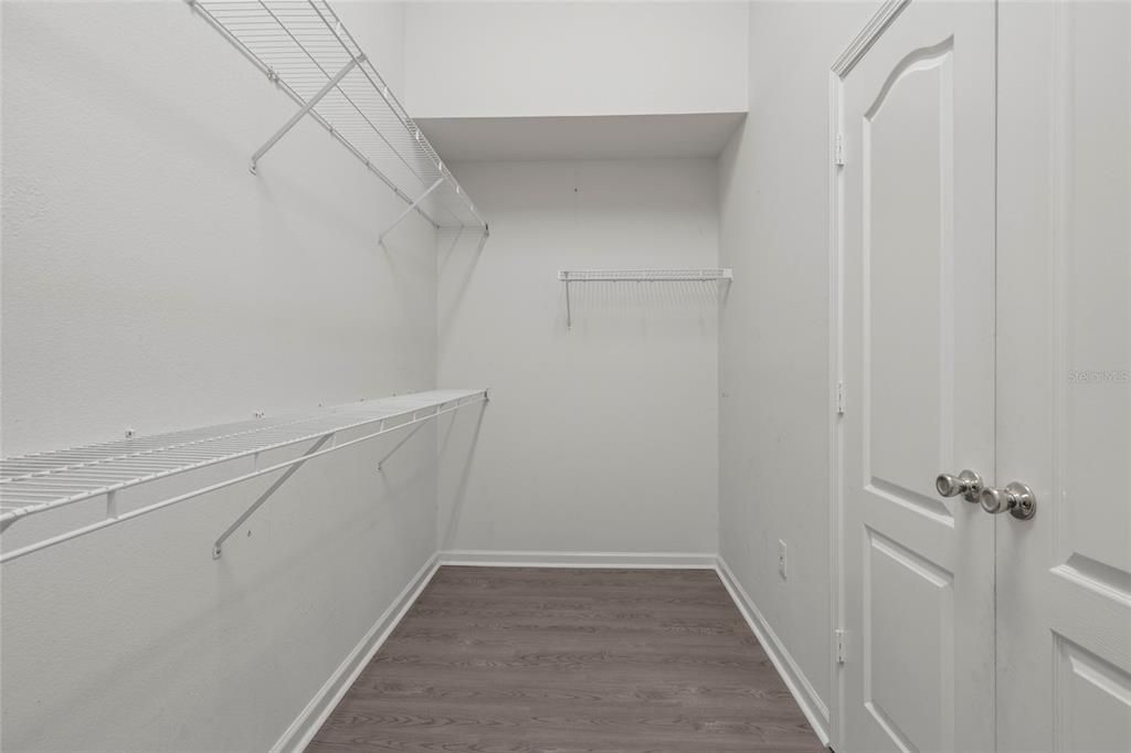 Master Bedroom Closet with Vaulted Ceiling for added storage space