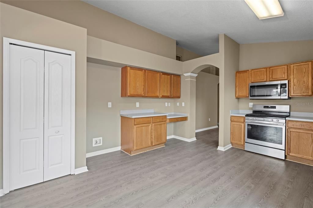 Kitchen with stainless steel GAS Range, Microwave and Dishwasher