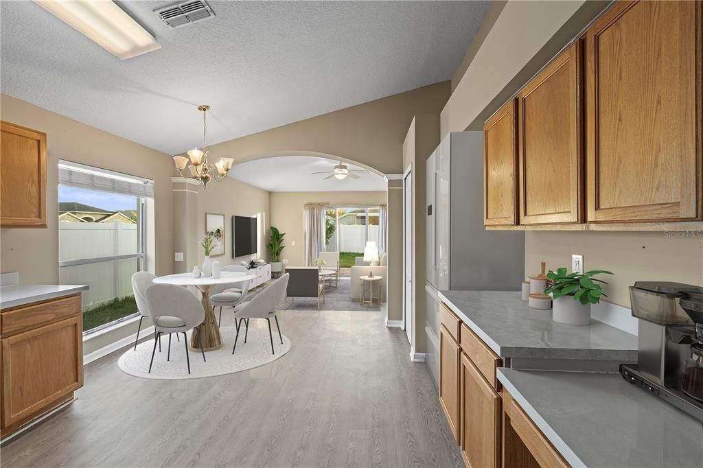 Kitchen with Dinette area overlooking Family room