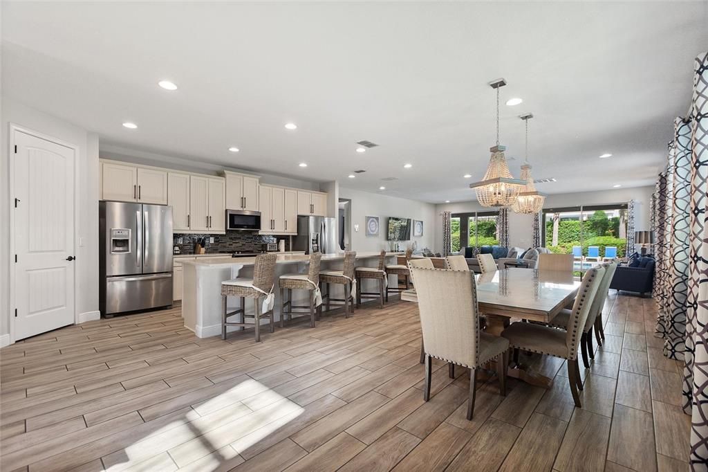 The dining room has a pantry, 2 refrigerators, 2 dishwashers, a range, microwave, and more.