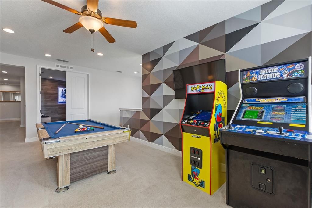 Another view of the bonus room/game room looking toward the media room.