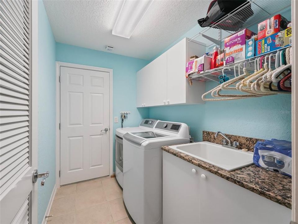 Leading from kitchen toward garage.