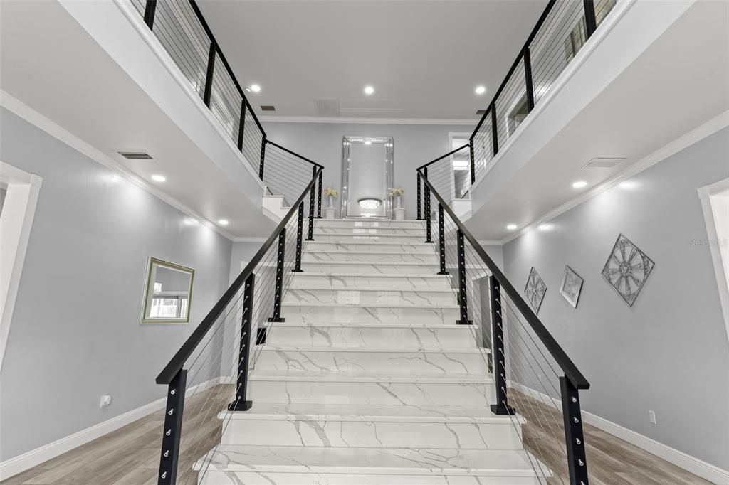 Majestic Two-Story Foyer Grand Entryway & Majestic 2 Story Foyer with custom quartz staircase with modern cable railing