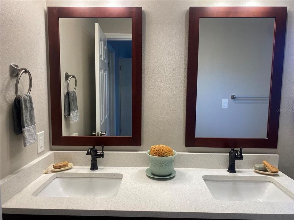 Dual sinks, one for him and one for her.