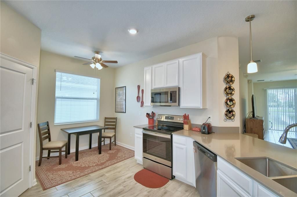 Dinette/breakfast nook at the far side of the kitchen