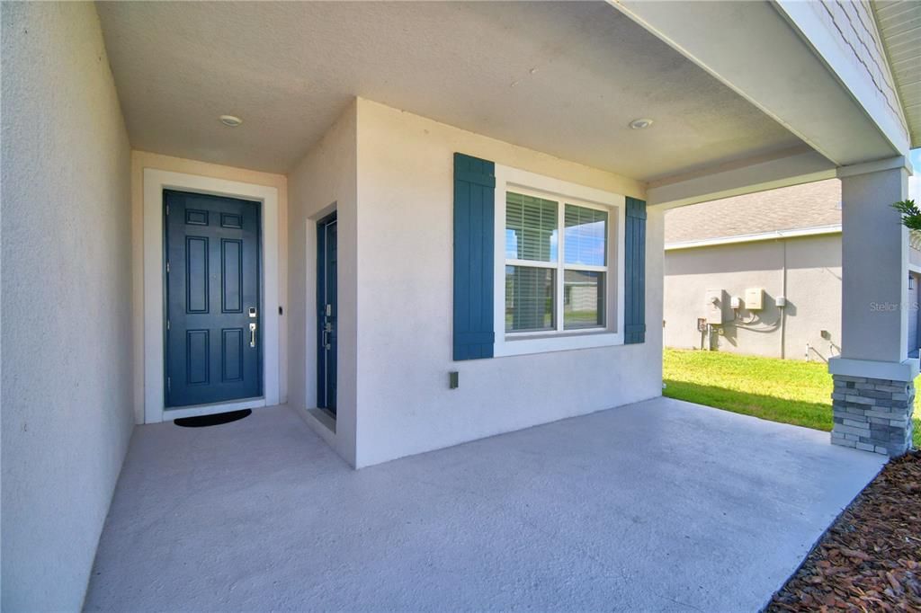 Welcoming front porch. Put out a few chairs and greet the neighbors!