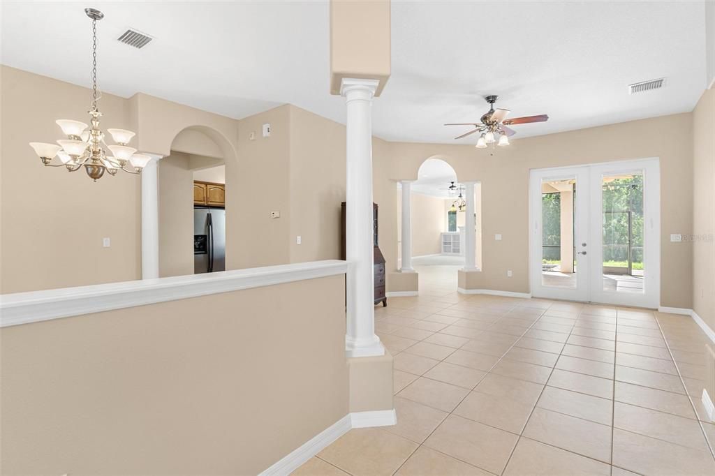 Entering front door to foyer. Left is formal dining room.