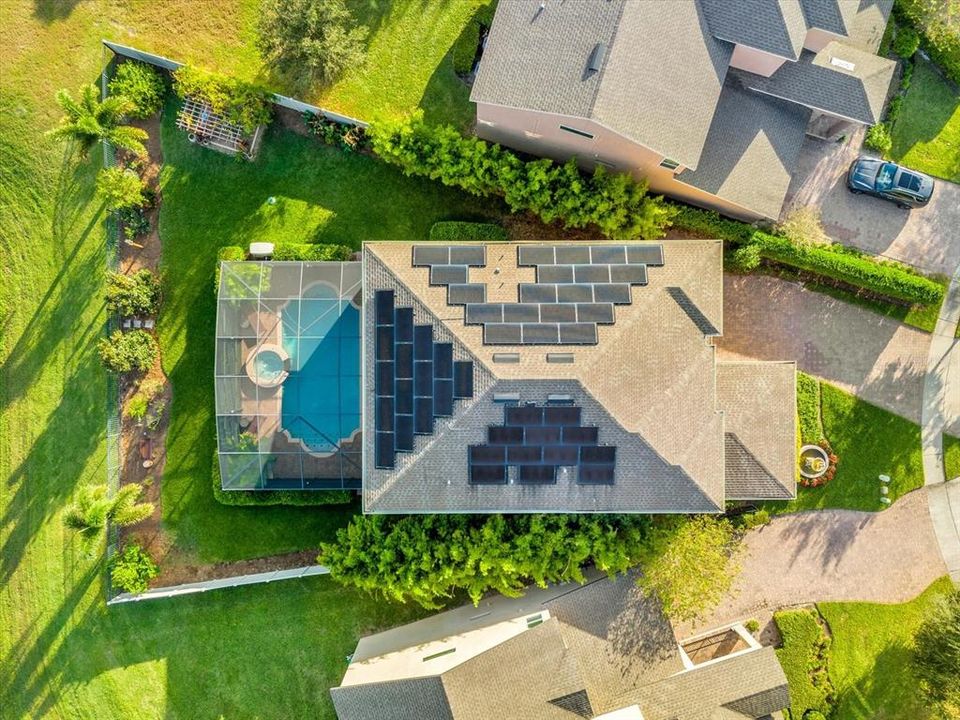 Aerial view, showing 48 panel Tesla PV system