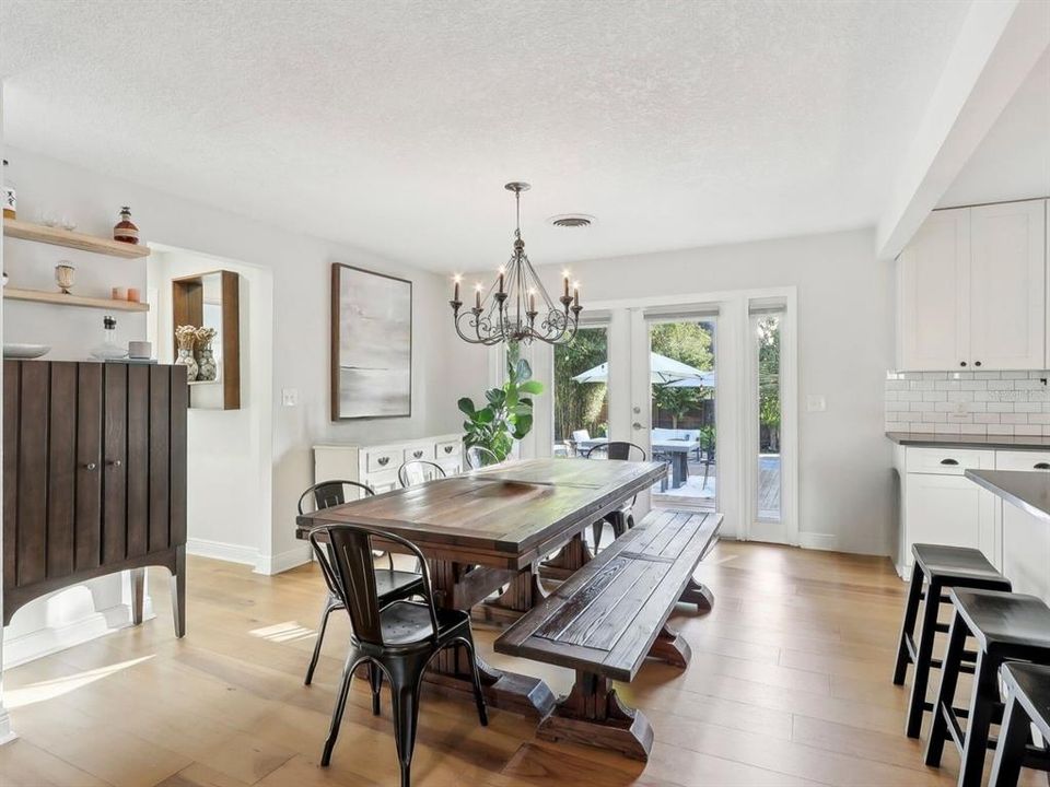 Dining Room With French Doors to Beautiful Entertaining Back Yard