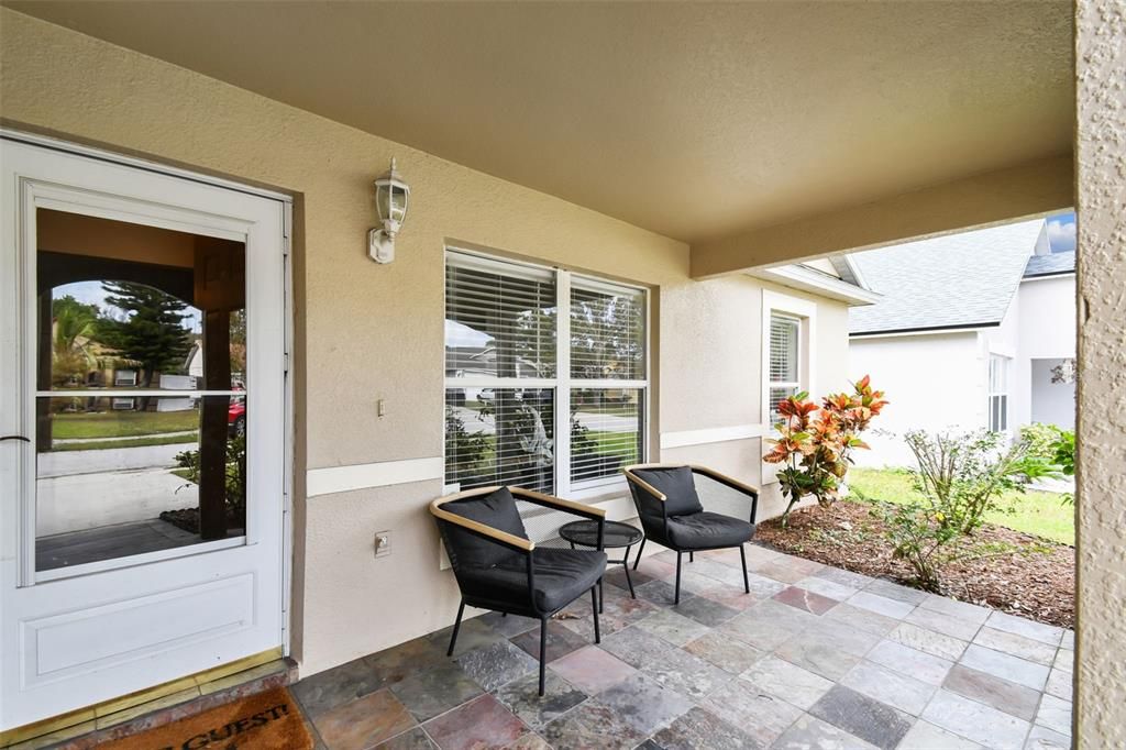 Large, tiled entry porch