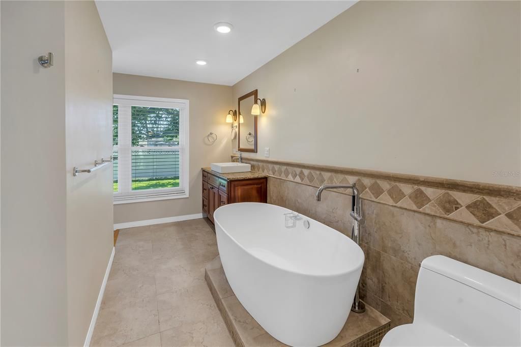 Primary bathroom and soaking tub.