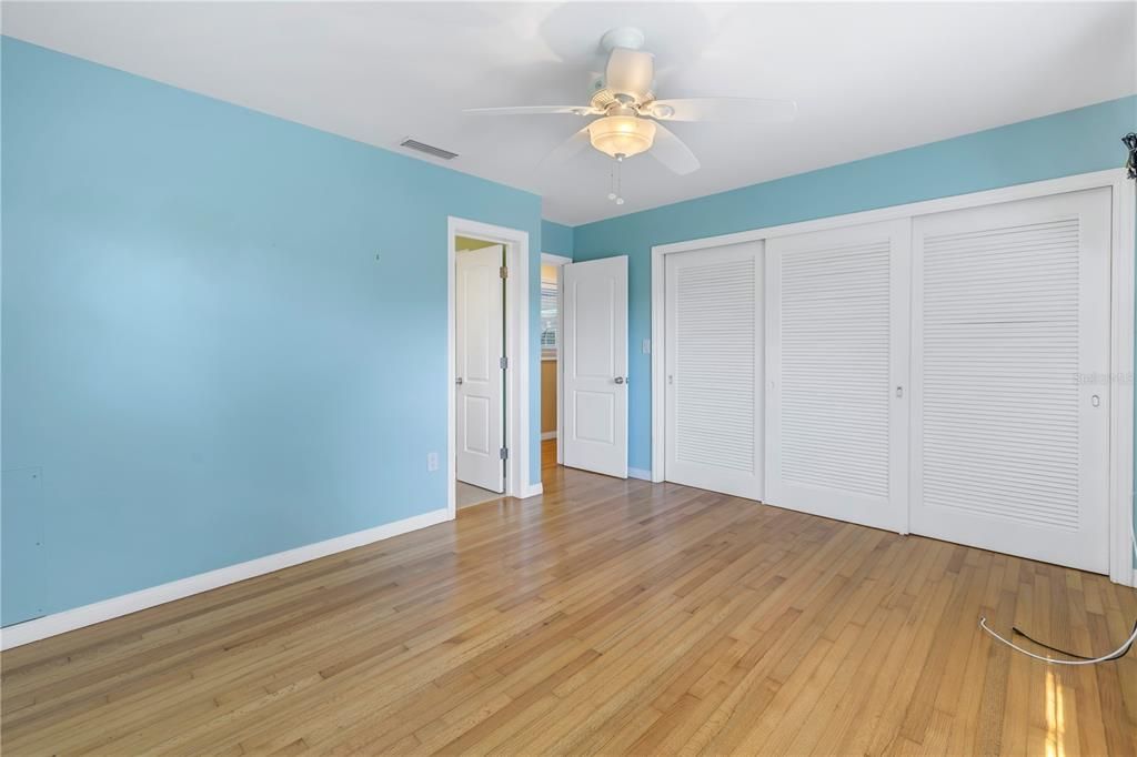 Guest bedroom #3 features a large closet and en-suite bathroom.