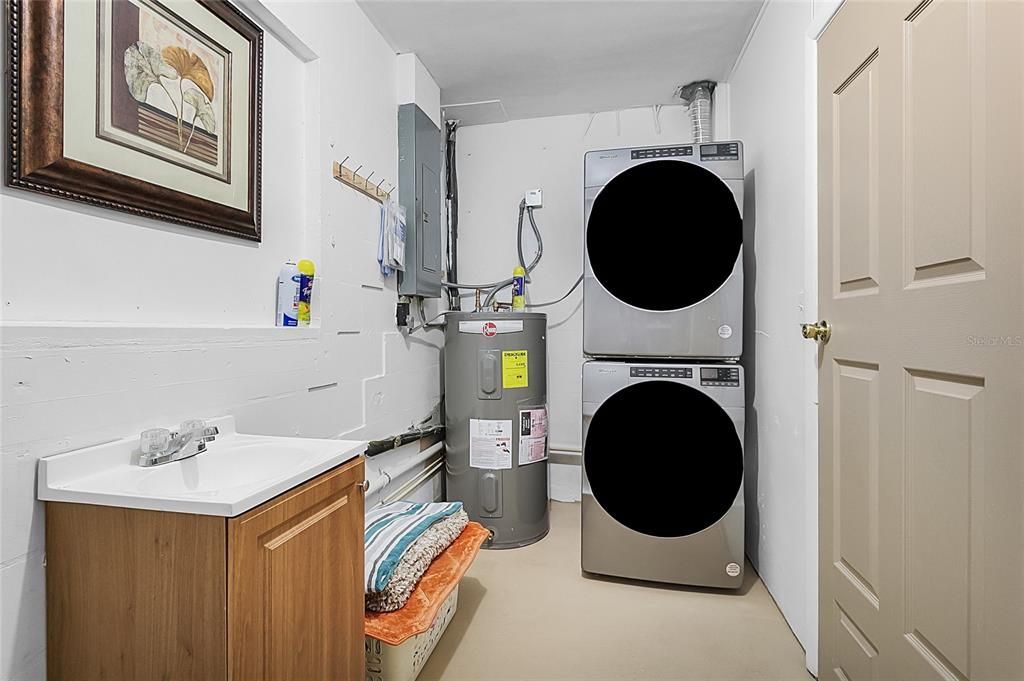 New Washer and Dryer set stays with house in Laundry Room.