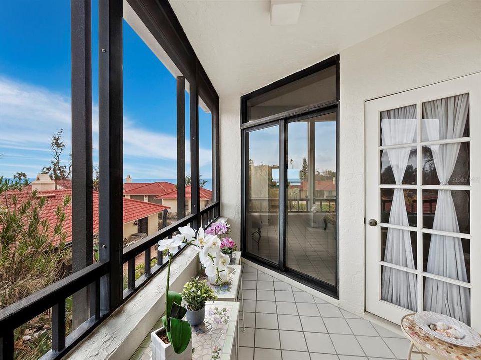 Accessible from Third Bedroom, Florida Room, and Foyer, this cozy Screened Lanai is a perfect home for your herbs and florals.