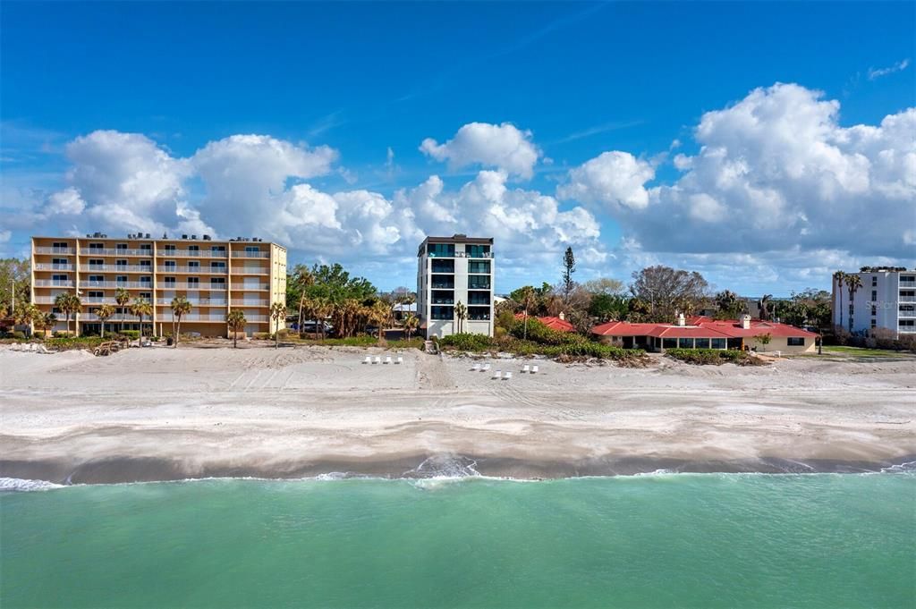 Enjoy powdery white sand and turquoise azure waters, from your private beach access with beach loungers.