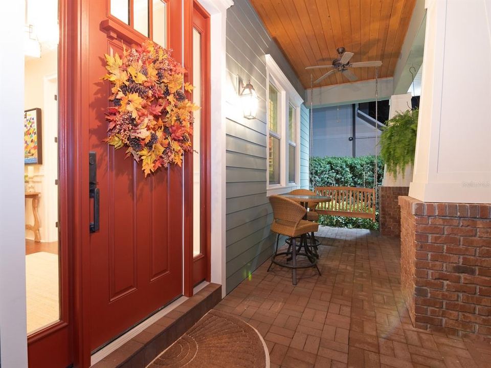 hall flanked by walk in closets connects primary bedroom and bath.