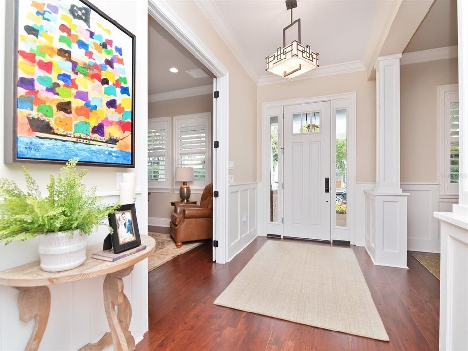 Gracious foyer is flanked by living and dining rooms.