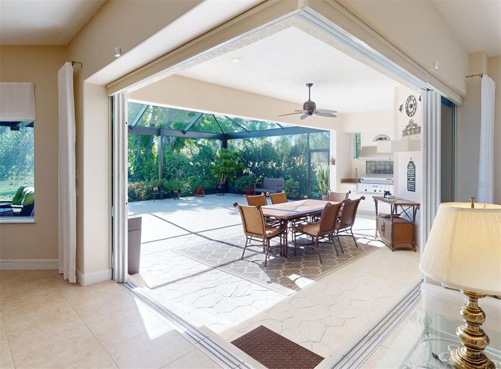 Area in lanai under cover looking from kitchen and living room.