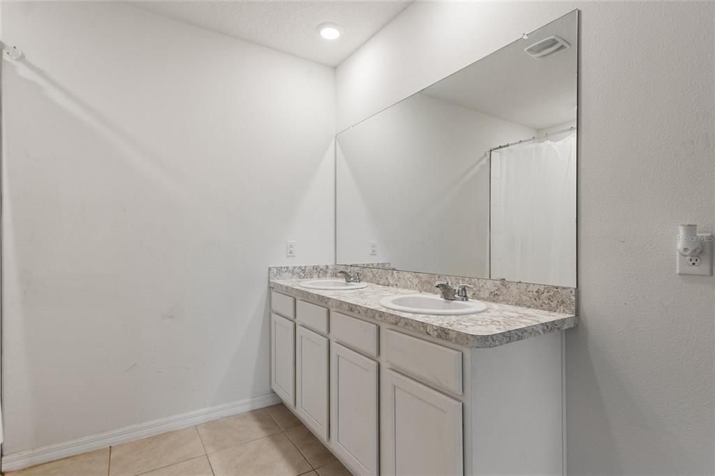 En-suite Bathroom with dual sinks