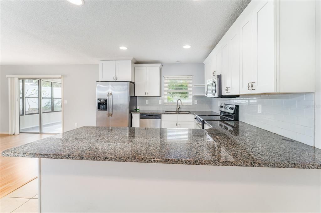 Beautiful kitchen and sliding glass door to the gorgeous patio