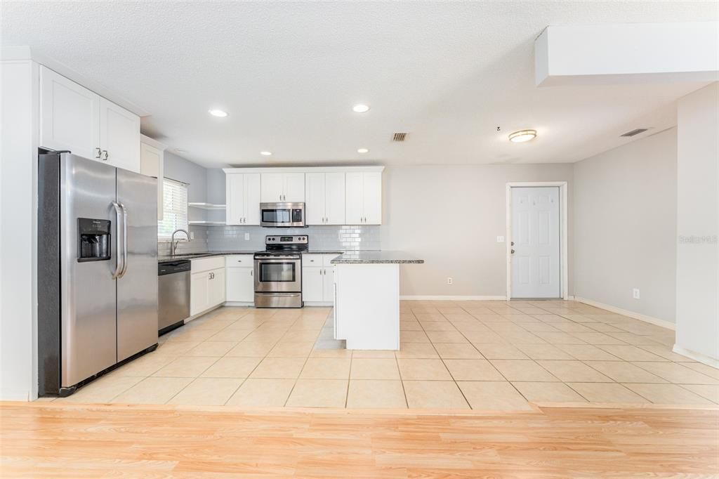 Spacious kitchen. The door leads to the garage