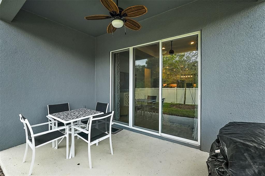 Covered rear patio offers a gas hook up for your grill