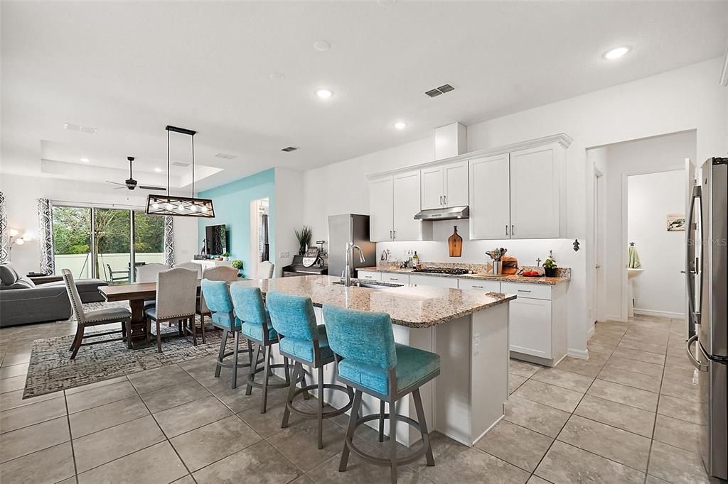 A chef's dream kitchen with large island and counter seating