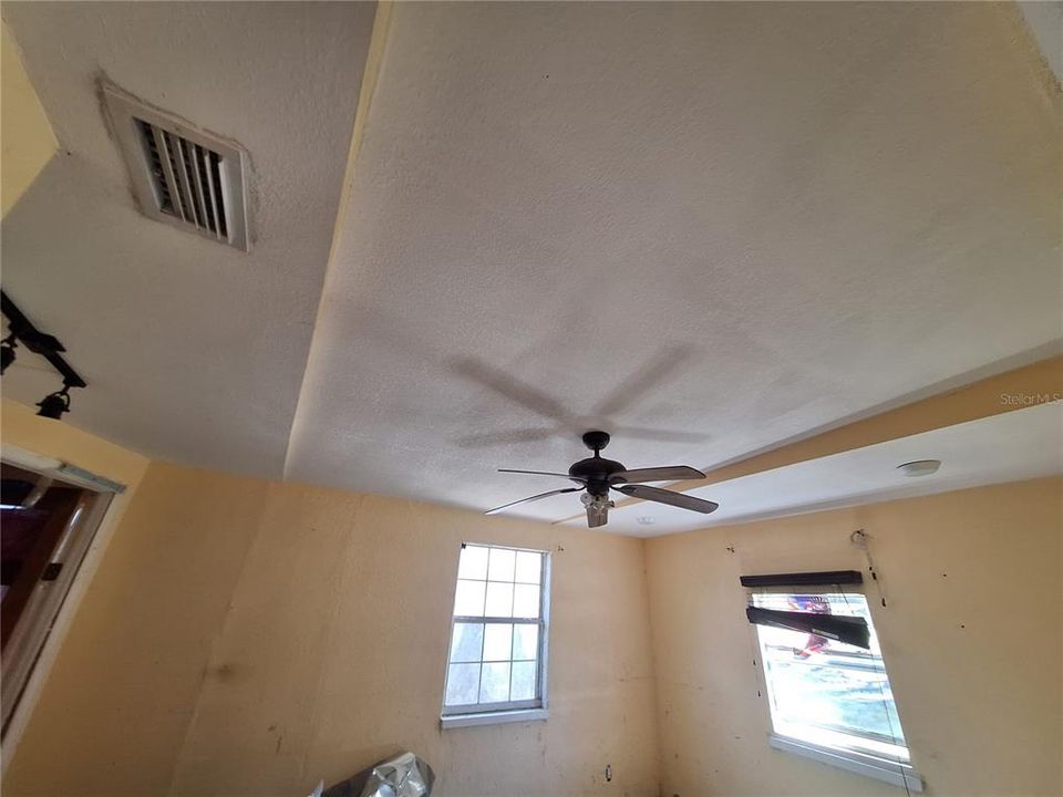 Ceilings all appear undamaged by storms. Primary Vaulted Ceiling