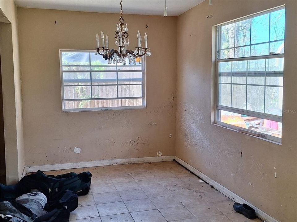 Formal Dining Room with Newer Windows and Tile Floor