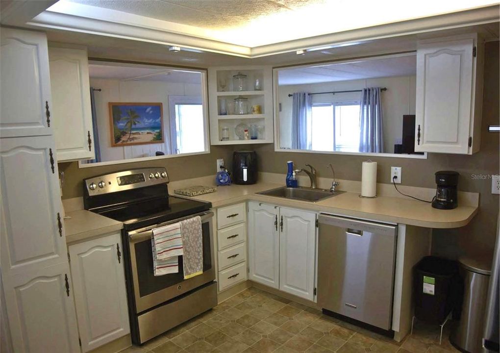 Kitchen is generously sized with almost new appliances