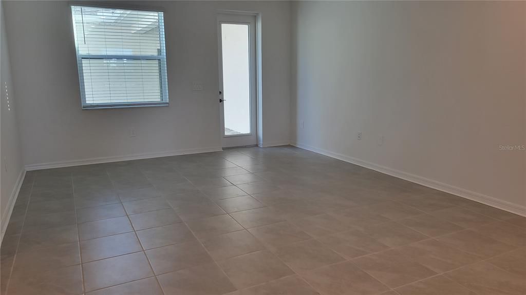 living room leading to private courtyard