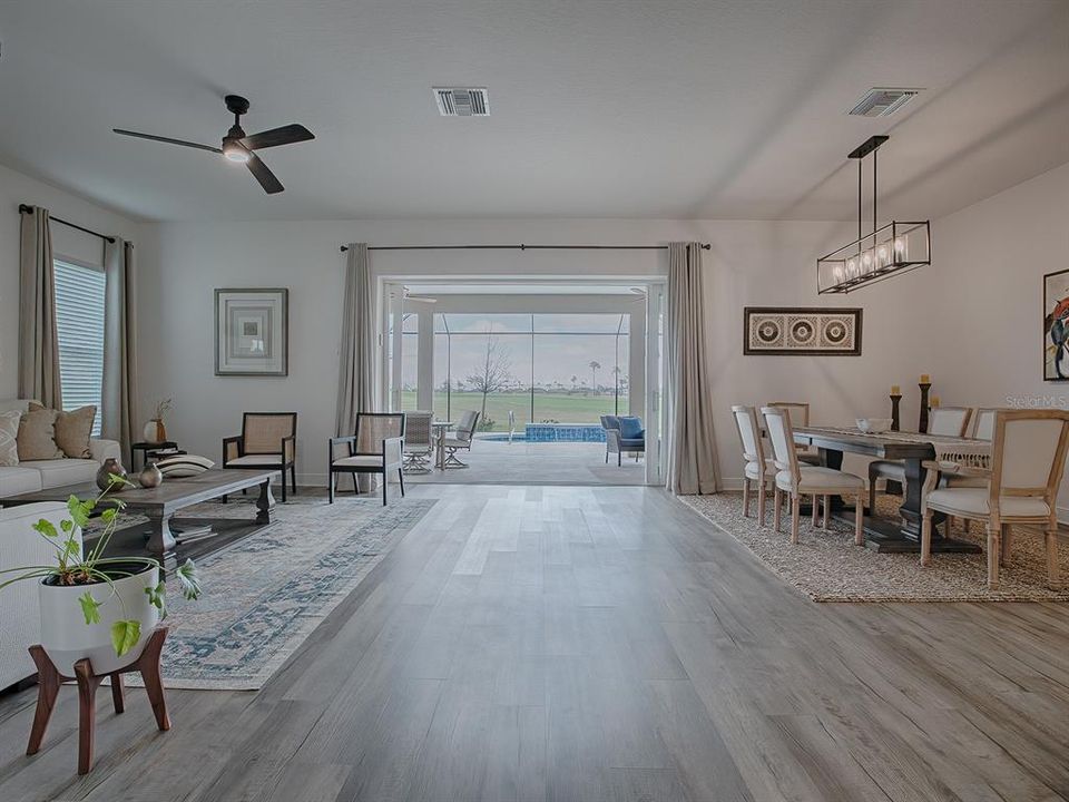 WHAT A GREAT VIEW AS YOU ENTER THE HOME.  LUXURY VINYL PLANK FLOORING FLOWS THROUGHOUT THE ENTIRE HOME.