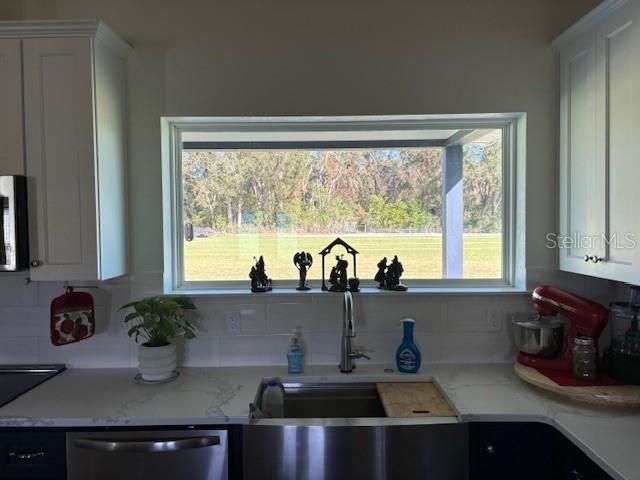 large picture window over sink