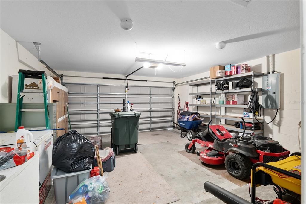 2 car garage with shelving