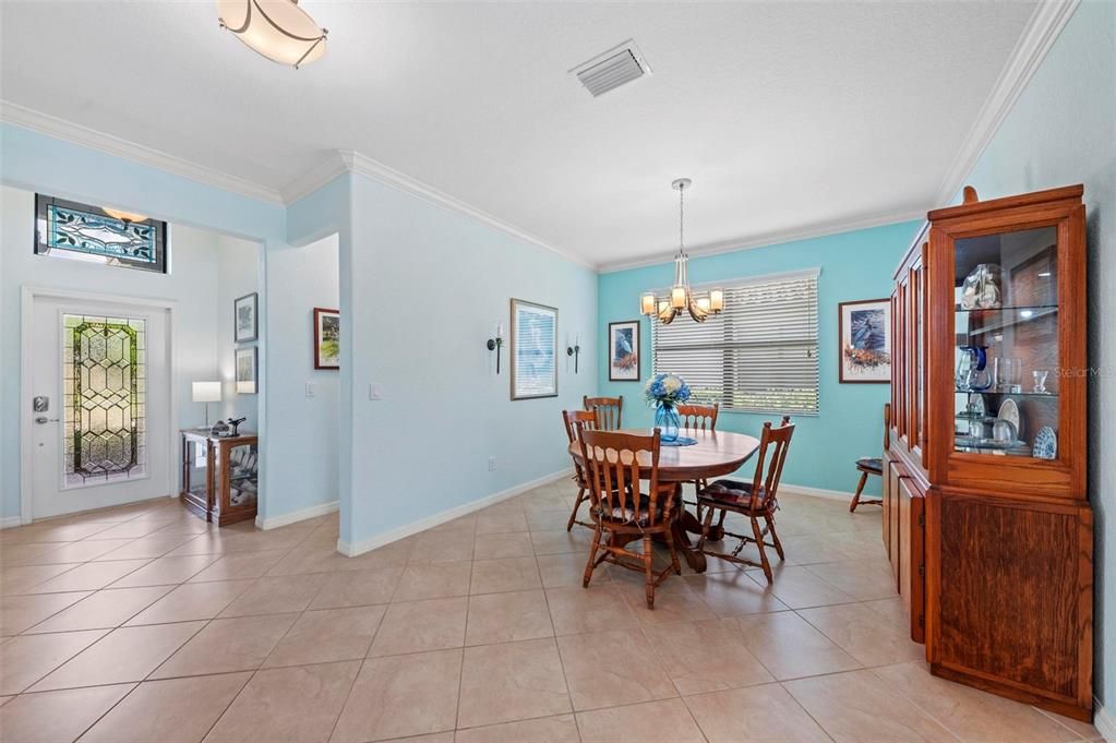 Entry foyer with hall to front guest suite and dining area