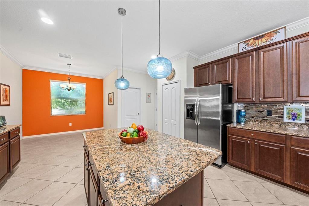 Breakfast nook at end of kitchen plus a formal dining room!  Pantry and laundry room.