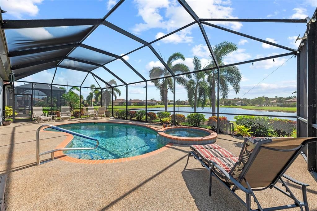 large pool deck with lounging area at both ends