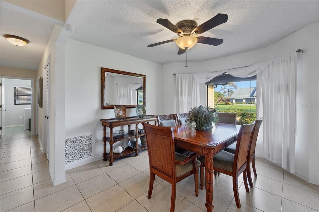 Dining area is located off the living room opening up the space further.