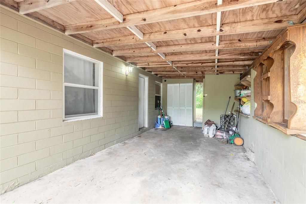 Carport with laundry closet