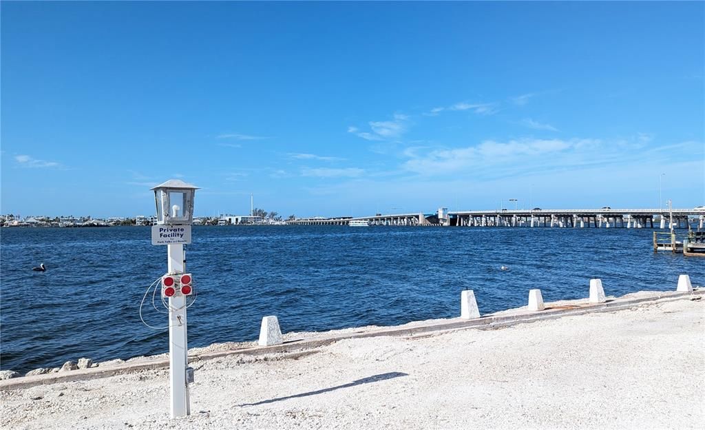 END OF STREET VIEW OF WATER, CORTEZ BRIDGE TO ANNA MARIA ISLAND BEACHES