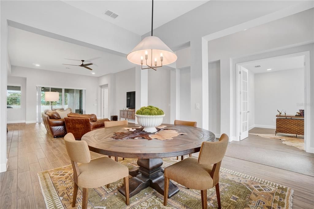 Formal Dining area overlooking Family Room, across from office/den