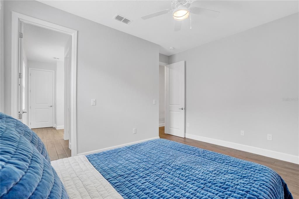 Downstairs Bedroom 2 with a Jack and Jill bathroom.