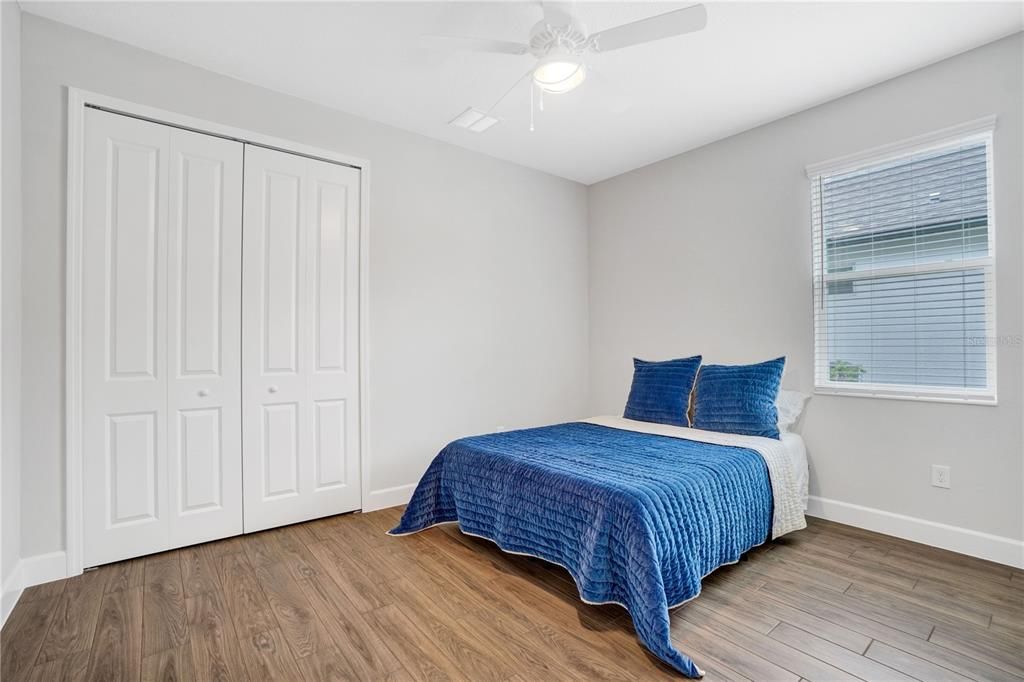 Downstairs Bedroom 2 with a Jack and Jill bathroom.