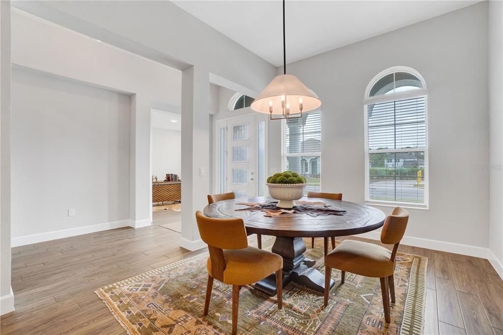 Formal Dining area overlooking Family Room, across from office/den