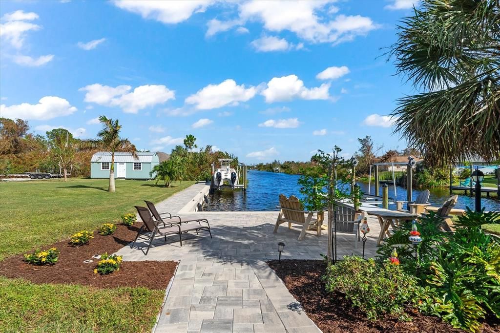 Private dock and sea wall with lift, designed for easy boat access and peaceful waterside relaxation.